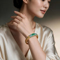 Burmese Imperial Green Floral Saddle Jadeite Bangle